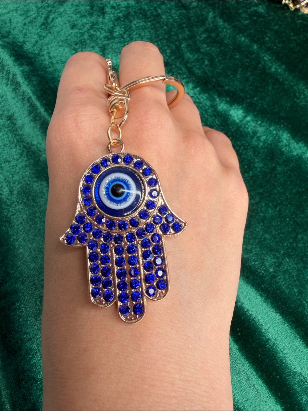 Gold Hamsa Hand Keychain with Blue Evil Eye and Blue Crystal Accents